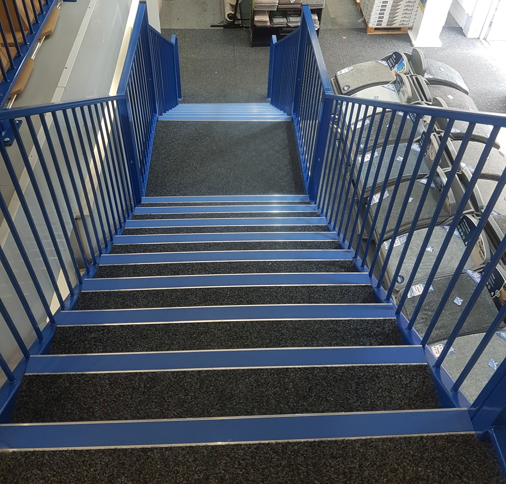 staircase for mezzanine floor in commercial setting