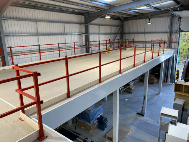 Retrofitted Kick Rails Mezzanine Handrails | Mezzanine Floors | Doity Engineering